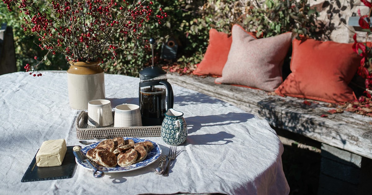 Luxury velvet cushions in tones of rust.