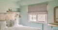 Handmade roman blinds supplementing luxury home decor.