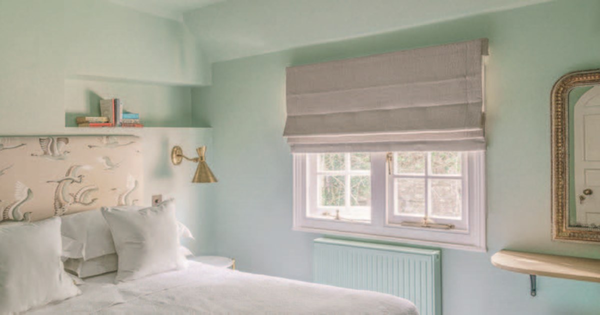 Luxury bed valances and bolster cushions creating a the perfect bedroom aesthetic.