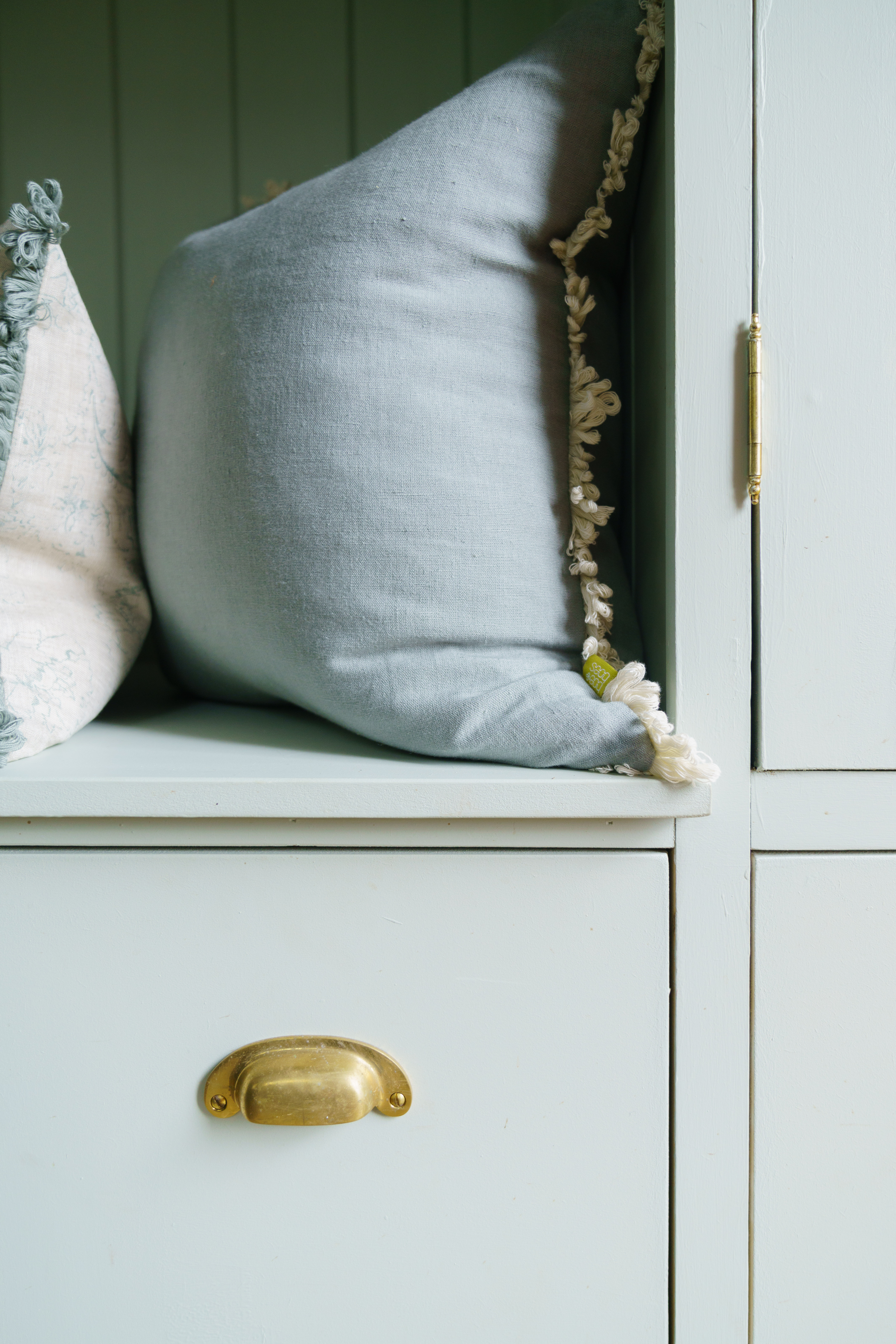 Pompom cushions by Boeboes, styled in an interior space.
