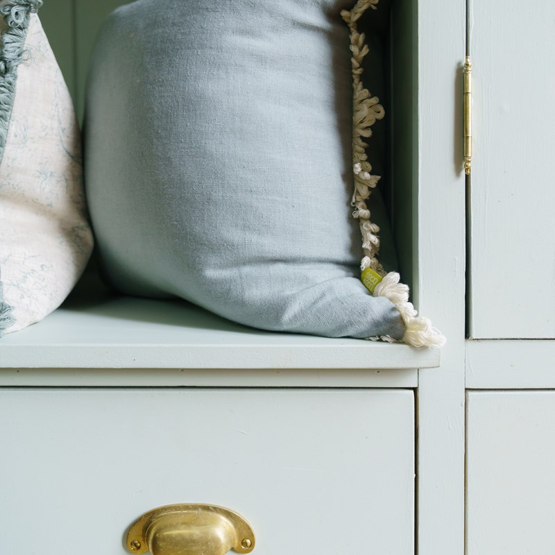 Pompom cushions by Boeboes, styled in an interior space.